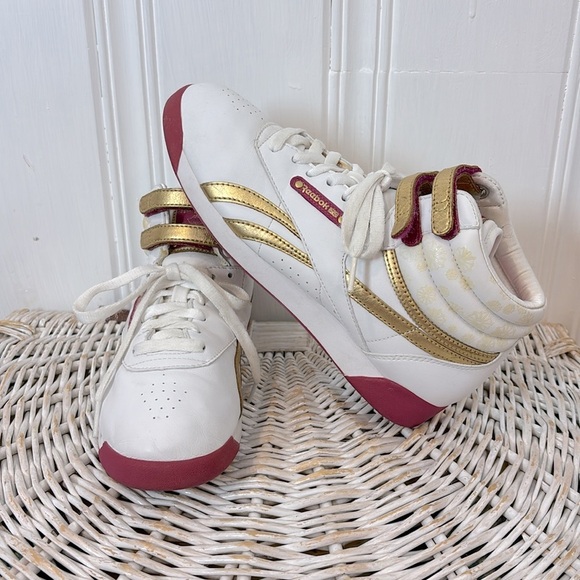 Reebok Shoes - REEBOK classic pink and gold freestyle leather women trainers